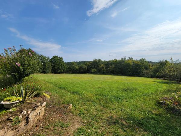 Charmante maison située dans de superbes jardins