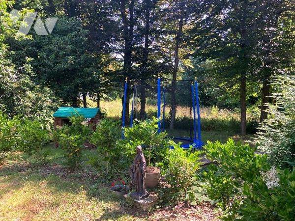 Appartement de caractère T4 rez-de-jardin dans une belle maison bourgeoise.