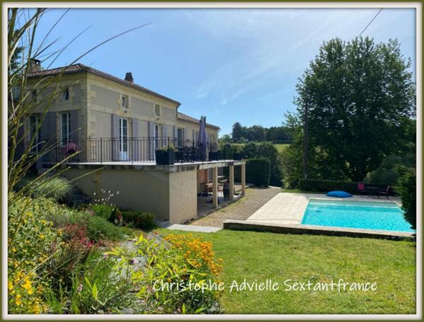 Ensemble immobilier, maison d'habitation, local commercial et gîtes sur 9127 M2