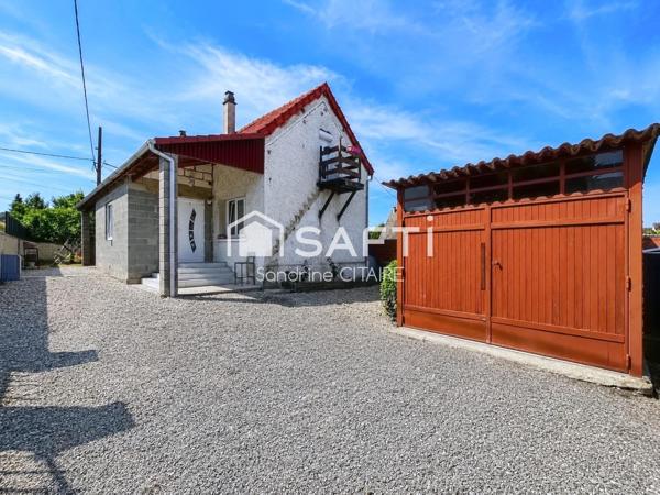Maison avec garage vendue louée à Anet