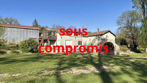 Maison avec moulin