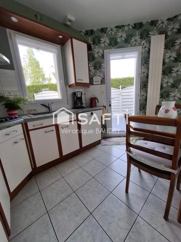 Maison 122 m² env- 3 chambres, bureau, garage double, sous sol.