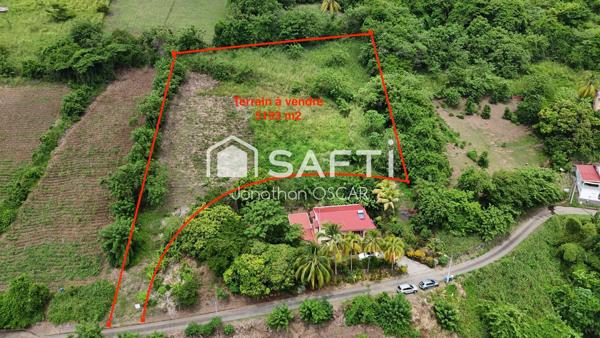 Terrain constructible 5 193 m2 Le Carbet vue mer