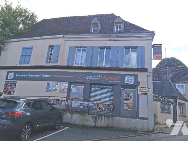 Une propriété à usage de commerce et d'habitation