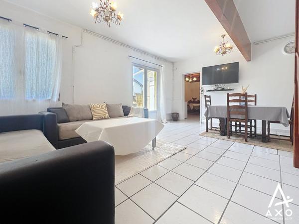 Maison de ville avec garage et jardin