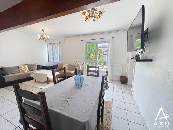 Maison de ville avec garage et jardin