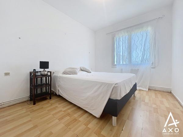 Maison de ville avec garage et jardin