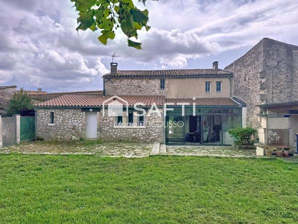 Maison familiale avec jardin et grand garage