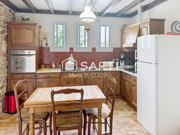 Maison familiale avec jardin et grand garage