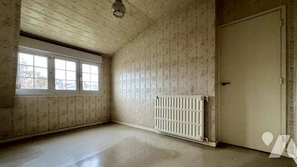 Maison de village à rénover avec garage