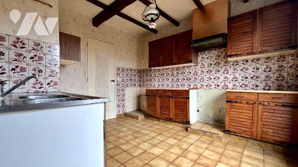 Maison de village à rénover avec garage