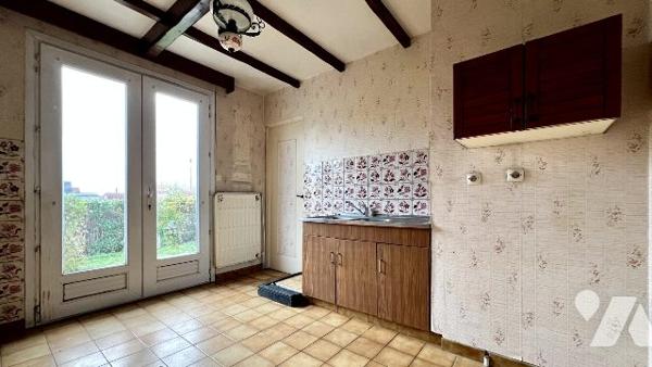 Maison de village à rénover avec garage