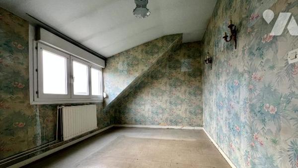 Maison de village à rénover avec garage