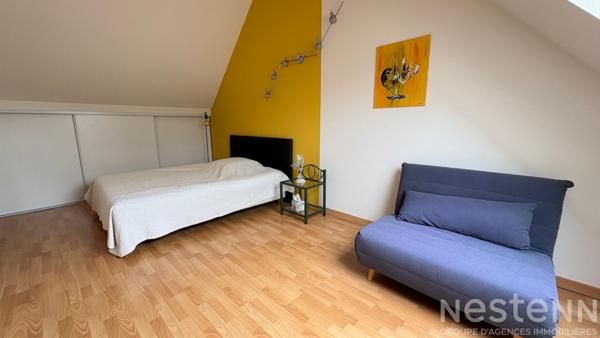 Maison contemporaine offrant une vie de plain de pied, à proximité du bourg