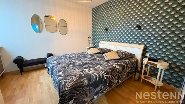 Maison contemporaine offrant une vie de plain de pied, à proximité du bourg