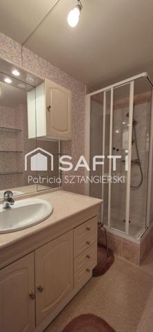 Très beau duplex de 105 m² avec terrasse, cave, place de parking dans résidence calme avec ascenseur, gardien.