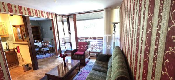Très beau duplex de 105 m² avec terrasse, cave, place de parking dans résidence calme avec ascenseur, gardien.
