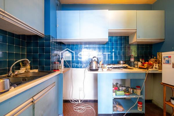 Etagé élevé, travaux à prévoir, lumineux