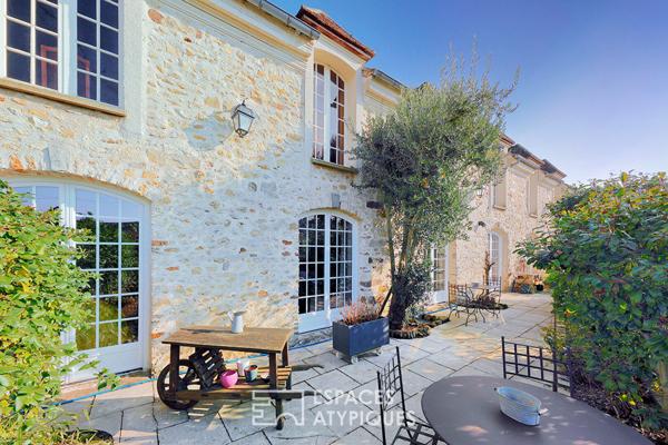 Bâtisse de charme en pierres avec jardin et dépendances