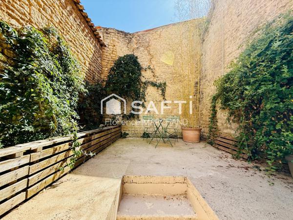 MAISON CENTRE VILLE 4 CH BUREAU  PATIO 15 m2 CAVE