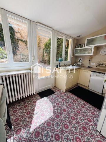 MAISON CENTRE VILLE 4 CH BUREAU  PATIO 15 m2 CAVE