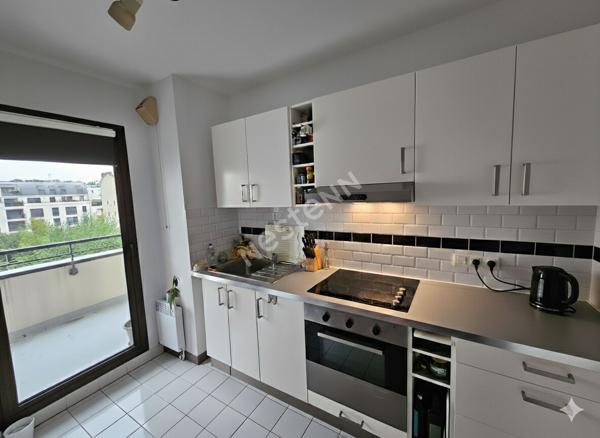 Puteaux limite Suresnes: Appartement de 2 pièces de 58m² avec balcon, cave et Parking