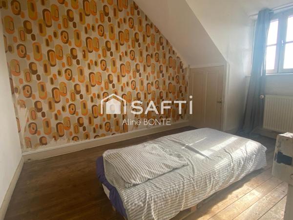 Maison mitoyenne avec jardinet