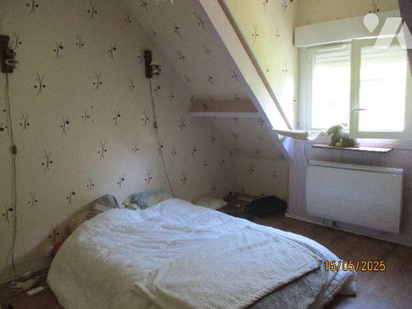 Pavillon de 170 m² avec terrain de 2.955 m² attenant.