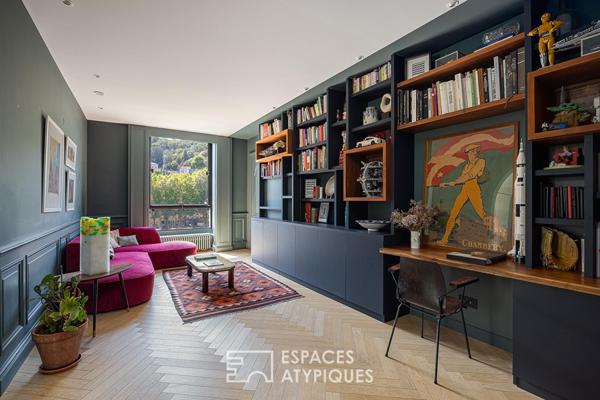 Appartement à l’élégance architecturale suspendue sur la Saône