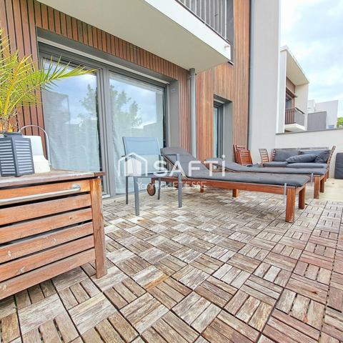 Deux pièces avec 17 m2 de terrasse et un parking sous-sol.