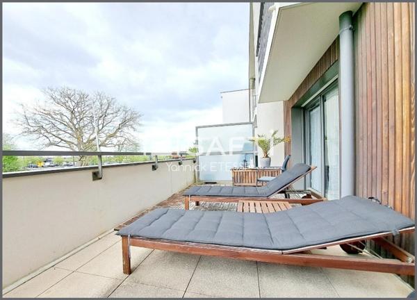 Deux pièces avec 17 m2 de terrasse et un parking sous-sol.