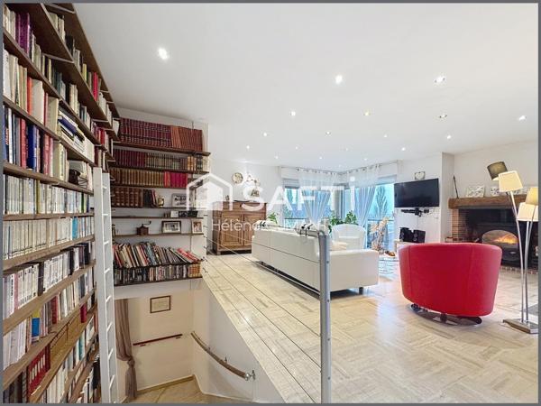 Maison d'architecte d'exception avec une vue à couper le souffle, au coeur d'un parc arboré.
