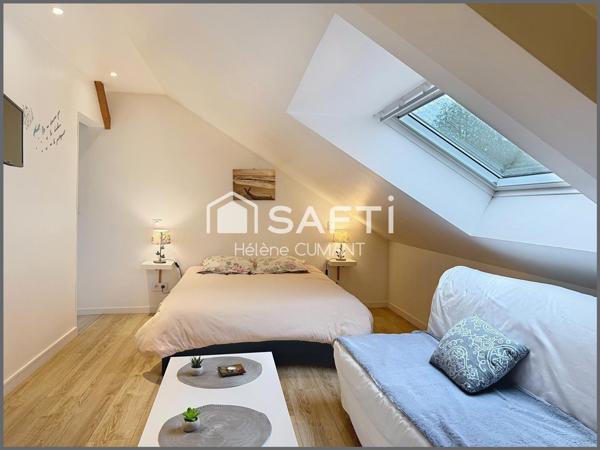 Maison d'architecte d'exception avec une vue à couper le souffle, au coeur d'un parc arboré.