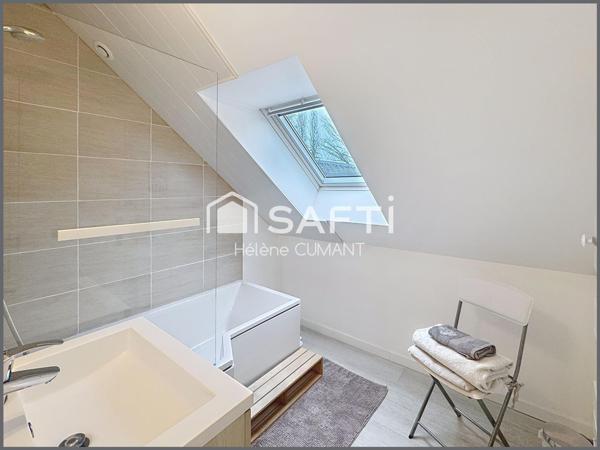 Maison d'architecte d'exception avec une vue à couper le souffle, au coeur d'un parc arboré.