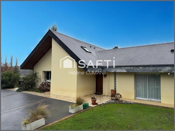 Maison d'architecte d'exception avec une vue à couper le souffle, au coeur d'un parc arboré.