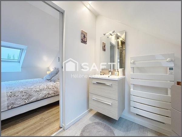 Maison d'architecte d'exception avec une vue à couper le souffle, au coeur d'un parc arboré.