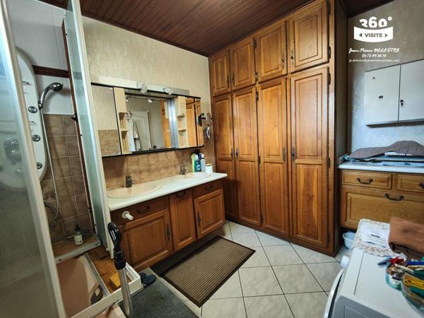 Maison individuelle avec grand terrain clos en centre-ville d'Echirolles