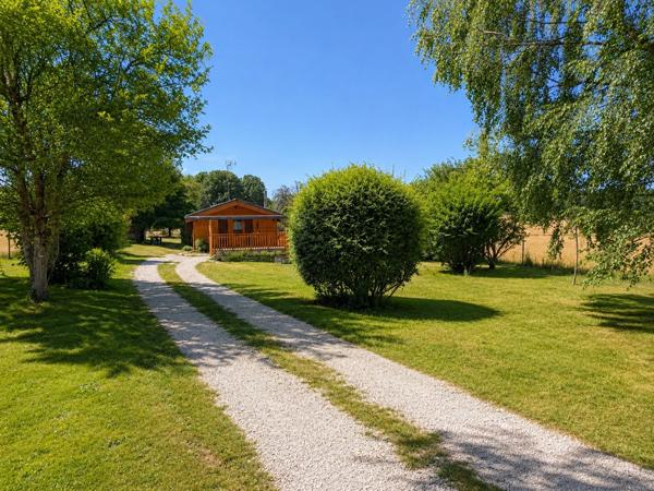 CONFORTABLE CHALET SUR GRAND PARC ARBORÉ