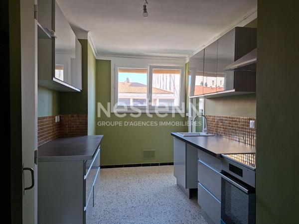 Appartement 3 pièces à vendre au centre-ville d'Alès avec vue sur le Gardon