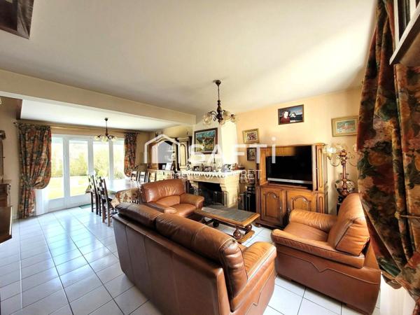 Maison Kaufmann & Broad proximité gare et écoles.