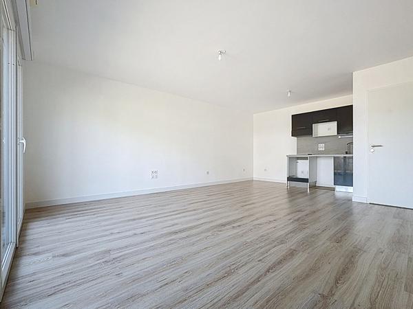 Appartement a vendre a ANCENIS avec deux chambres, ascenseur, balcon et place de parking couverte.