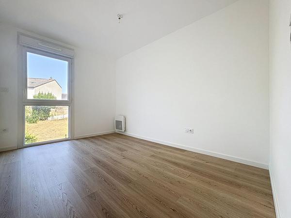 Appartement a vendre a ANCENIS avec deux chambres, ascenseur, balcon et place de parking couverte.