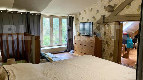 Maison ancienne atypique en coeur de village