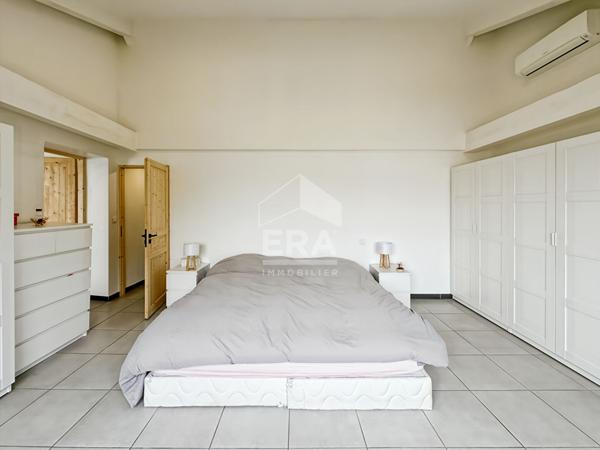 Maison de caratère en plein coeur de Rognonas 207m² habitables avec jardin.