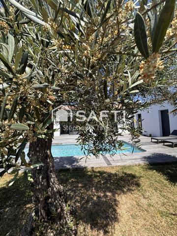 Maison familiale avec piscine, jardin et vue dégagée