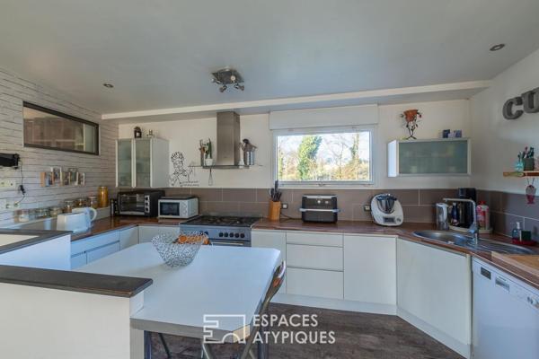 Charmante maison en pierre et son extension bois