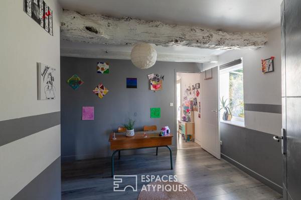 Charmante maison en pierre et son extension bois