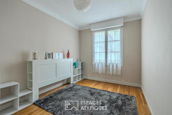 Appartement familial ambiance « Fifties » avec parking
