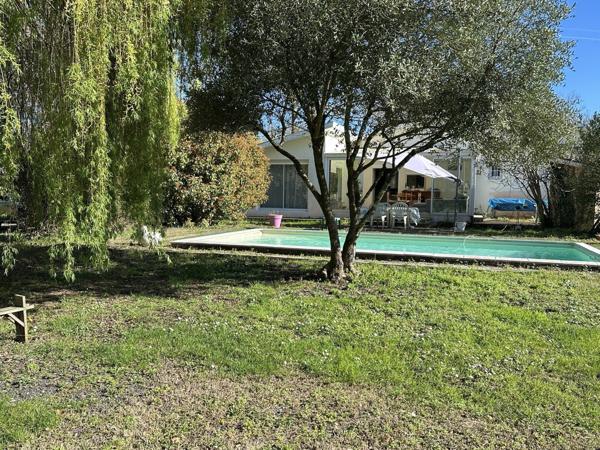 Maison 6 pièces sur parcelle de 2800m² avec garages et piscine