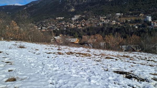 Très grand terrain constructible Briançon expo sud- 5 mn en voiture du centre ville